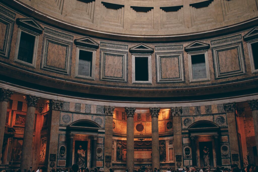 Interior view of the Pantheon showcasing its grandeur and architectural details in Rome, Italy.